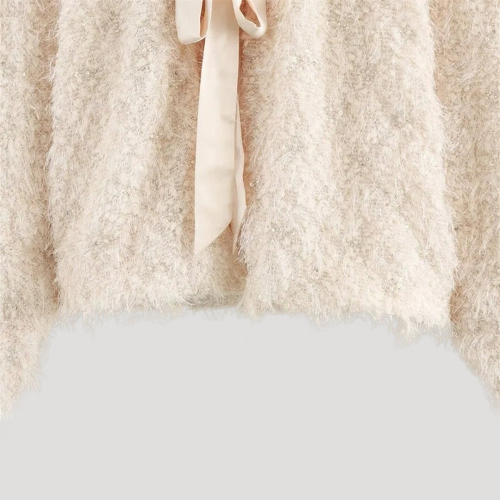 Stilla | Textureret Boucle Kappe Med Sløjfedetalje