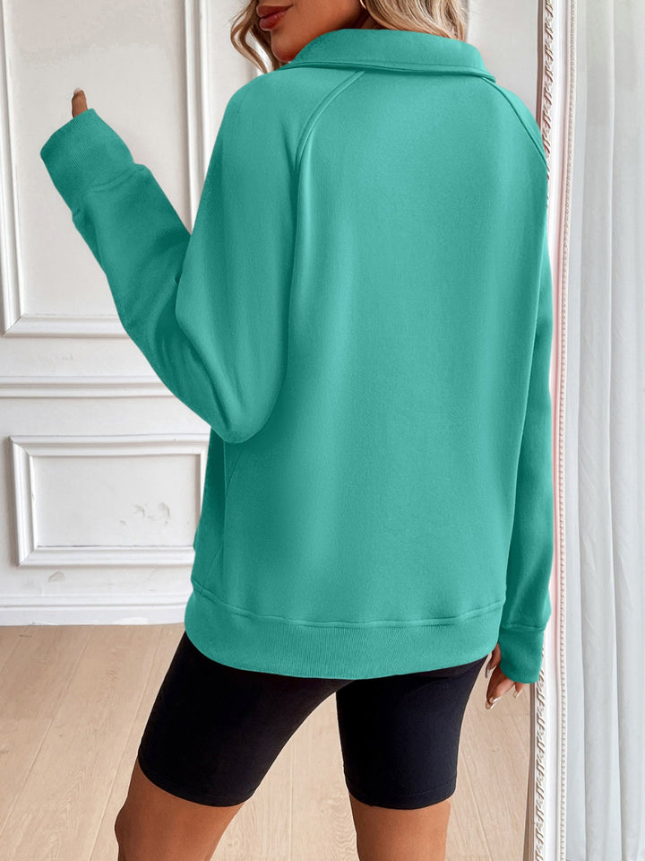 Stilla | Sved Demi Zip Med Raglanærmer