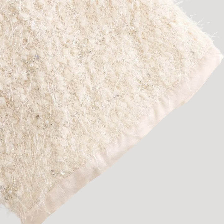 Stilla | Textureret Boucle Kappe Med Sløjfedetalje