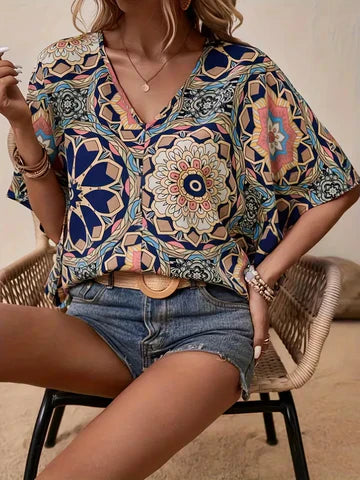 Stilla | Bluse med blomsterprint og V-udskæring