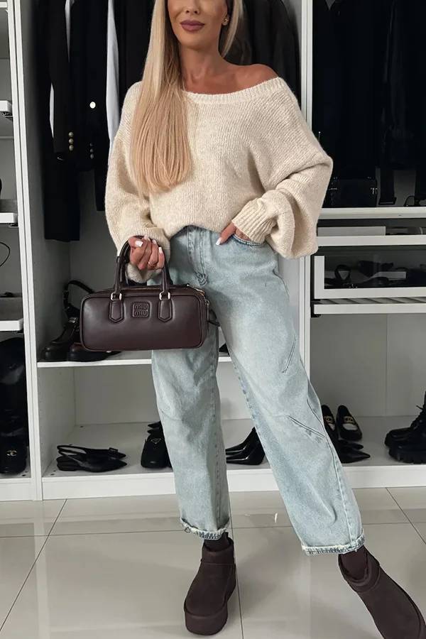 Stilla | Strikpullover med trendy kvaster, leopardmønster og bindebånd