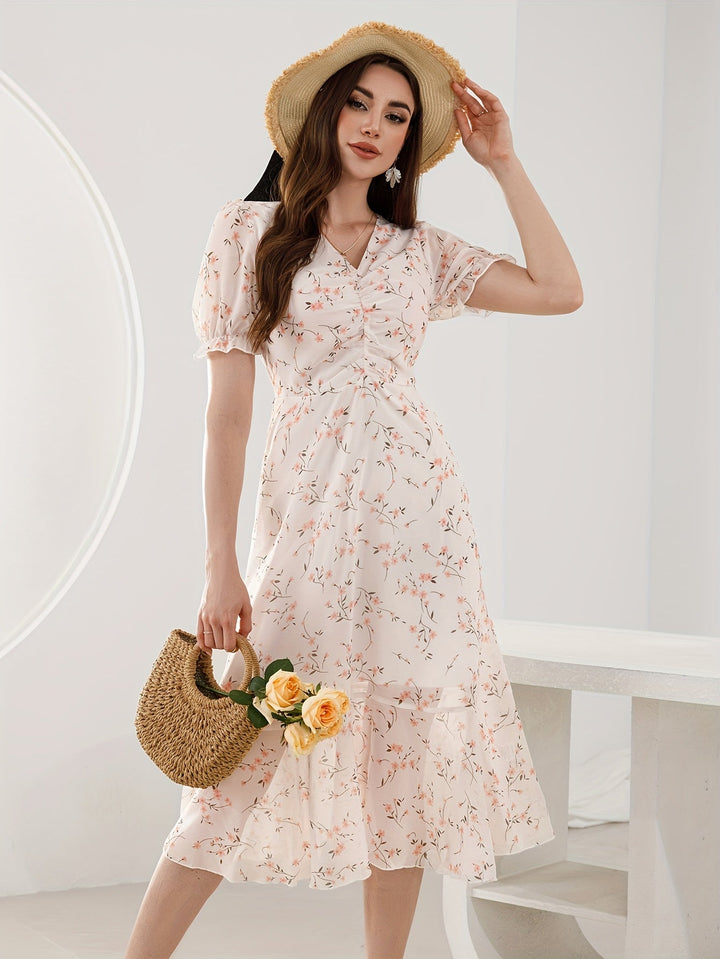 Stilla | Elegant Peplum Kjole Med Blomsterprint