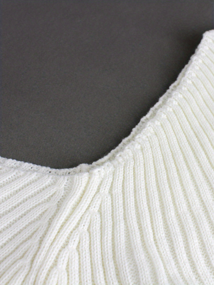 Stilla | Pullover i ribstrik med asymmetrisk udskæring