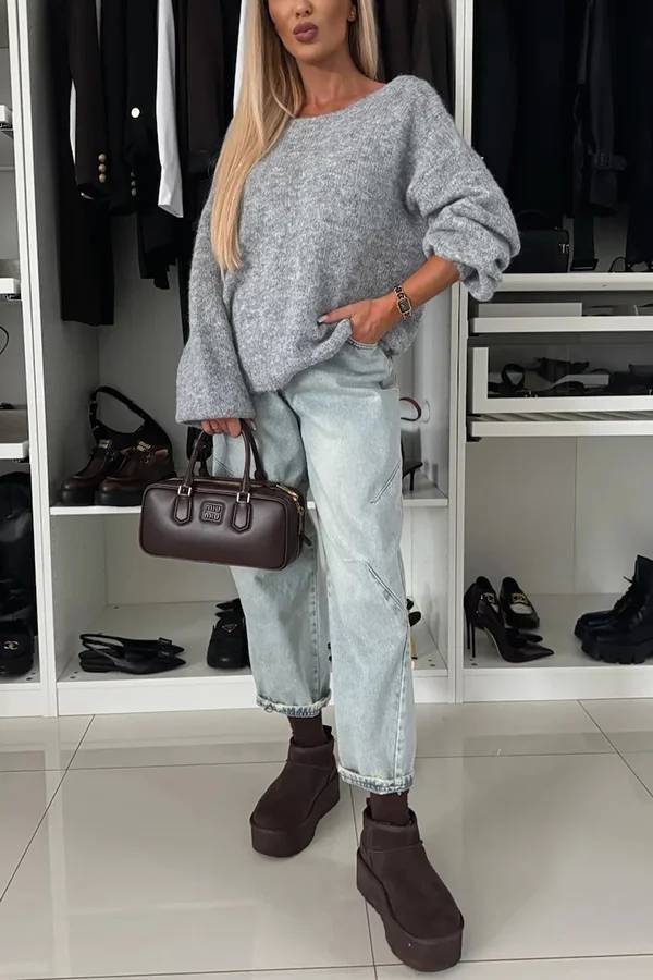 Stilla | Strikpullover med trendy kvaster, leopardmønster og bindebånd