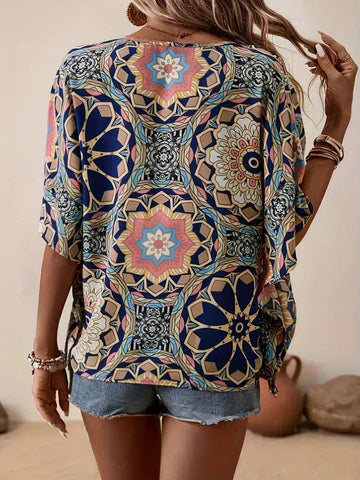 Stilla | Bluse med blomsterprint og V-udskæring
