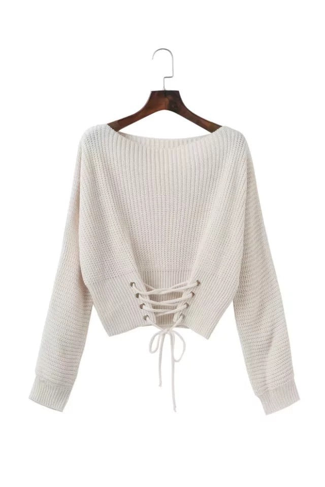 Kvindes fashionable strikbluse med sofistikeret snøre design Stilla