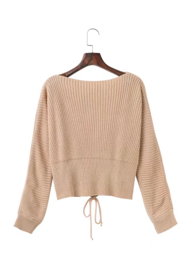 Kvindes fashionable strikbluse med sofistikeret snøre design Stilla
