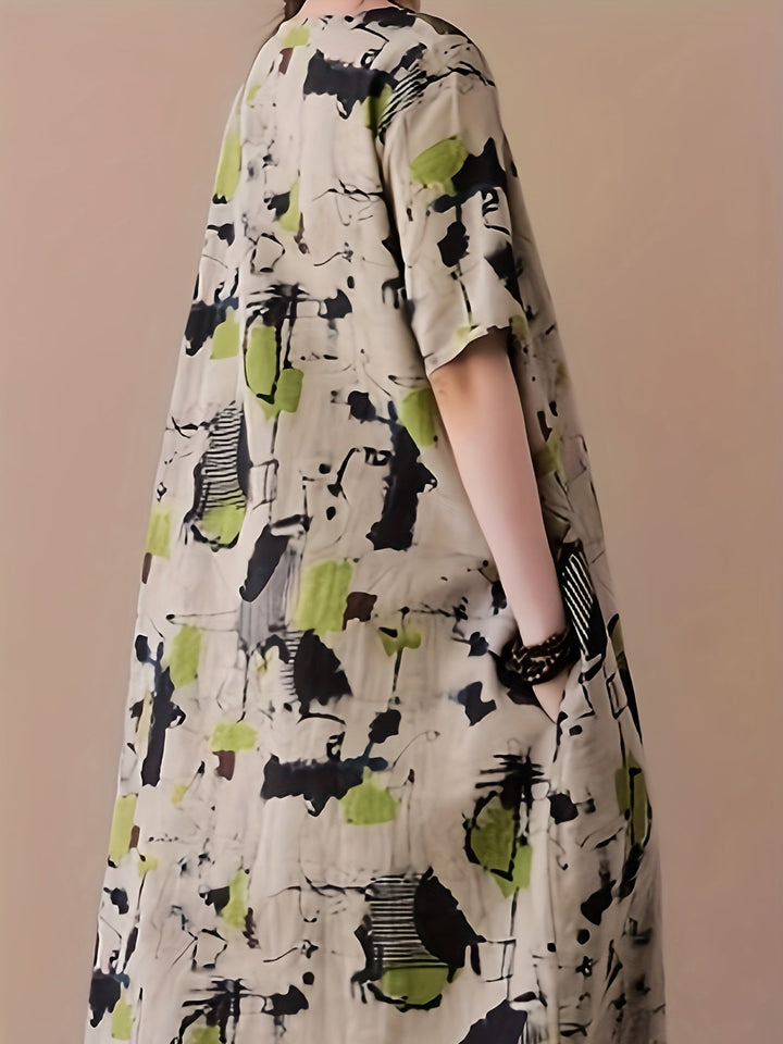 Stilla | Elegant Linned Midi Kjole Med Markant Abstrakt Mønster