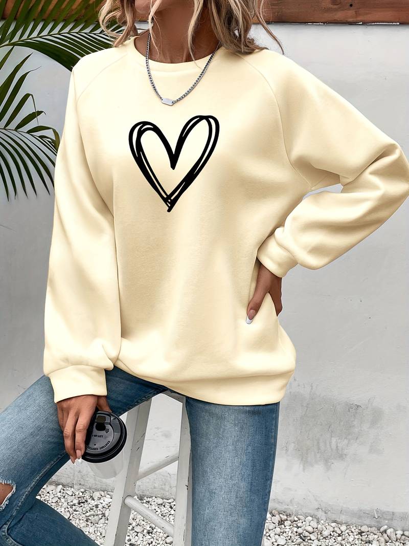 Stilla | Dame sweater med hjerte motiv