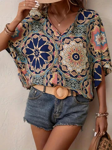 Stilla | Bluse med blomsterprint og V-udskæring