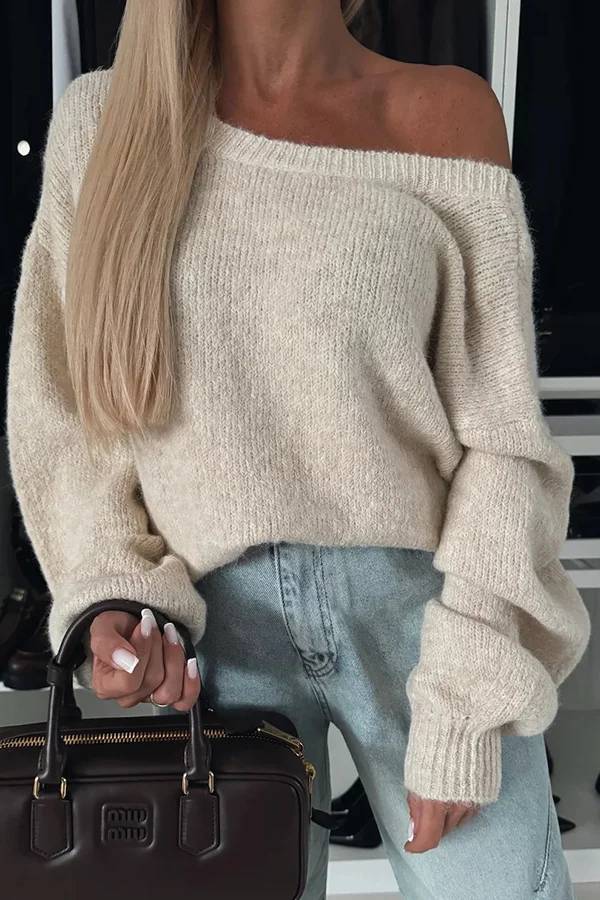 Stilla | Strikpullover med trendy kvaster, leopardmønster og bindebånd
