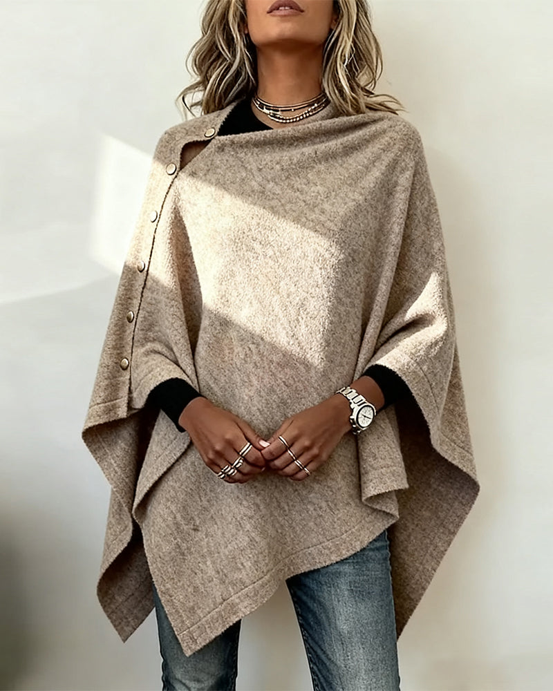 Stilla | Cape Design med Mode Atmosfære og Asymmetrisk Snit