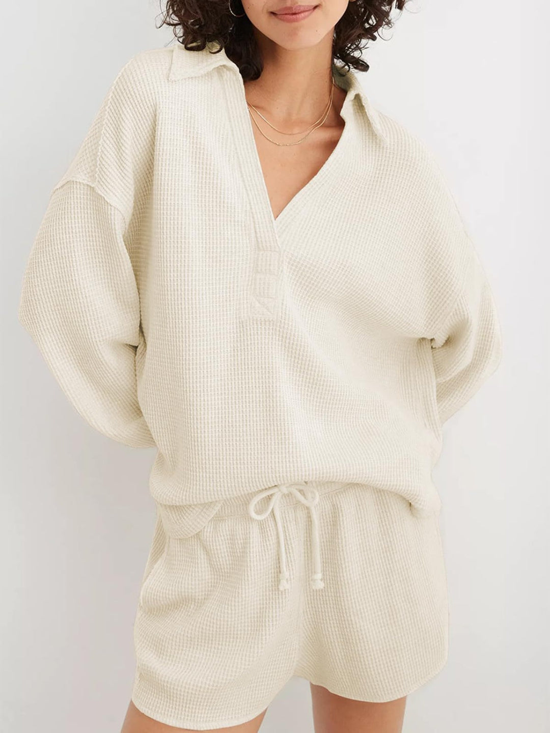 Stilla | Sweater med Johnny krave i struktureret strik med lange ærmer