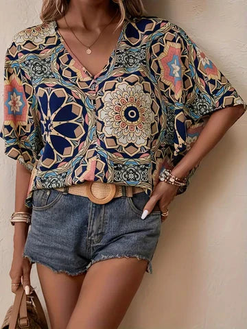 Stilla | Bluse med blomsterprint og V-udskæring