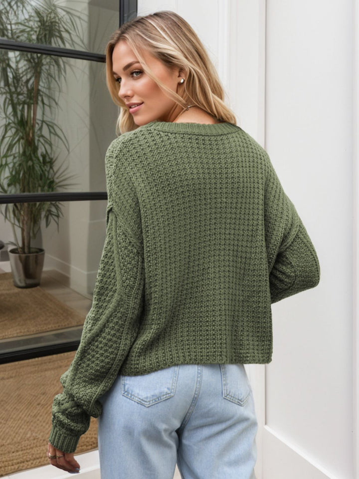 Stilla | Pullover af tvistet strik med rund hals og faldende skuldre