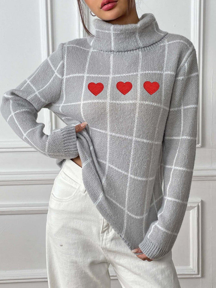 Stilla | Pullover med høj hals og lange ærmer med hjerteformet ternet mønster