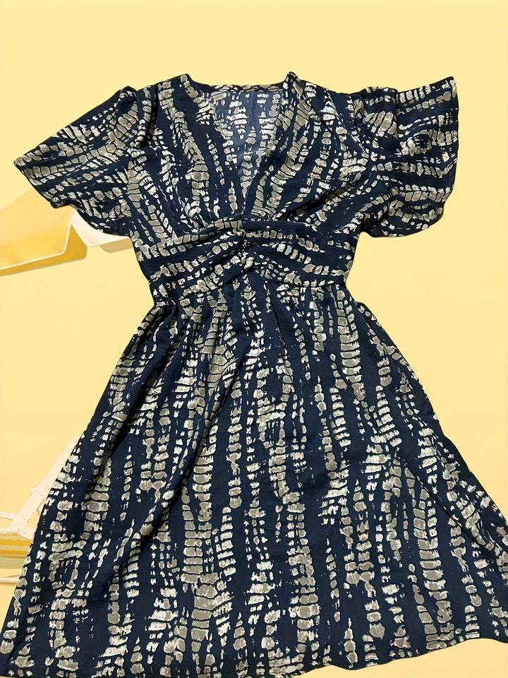 Stilla | Elegant Kvindekjole Midi Med Striber Og V-Hals