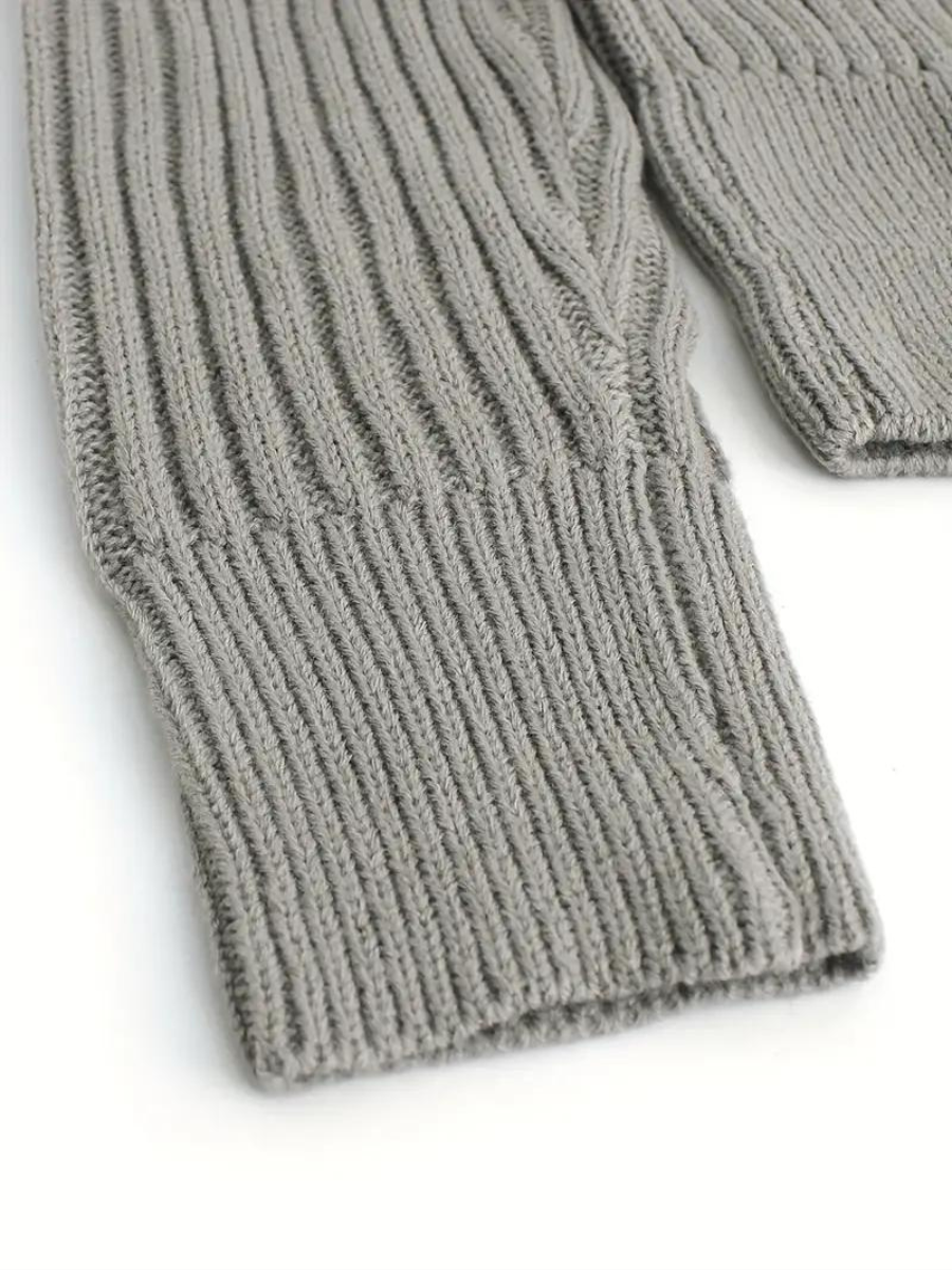 Stilla | Pullover i ribstrik med asymmetrisk udskæring