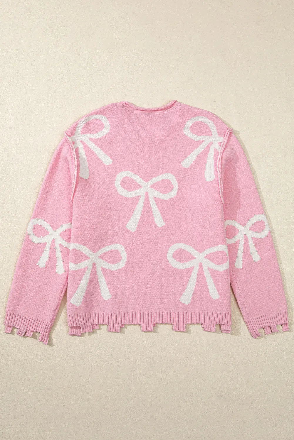 Stilla | Rundhalset Pullover Med Lange Ærmer og Perler samt Sløjfedetalje