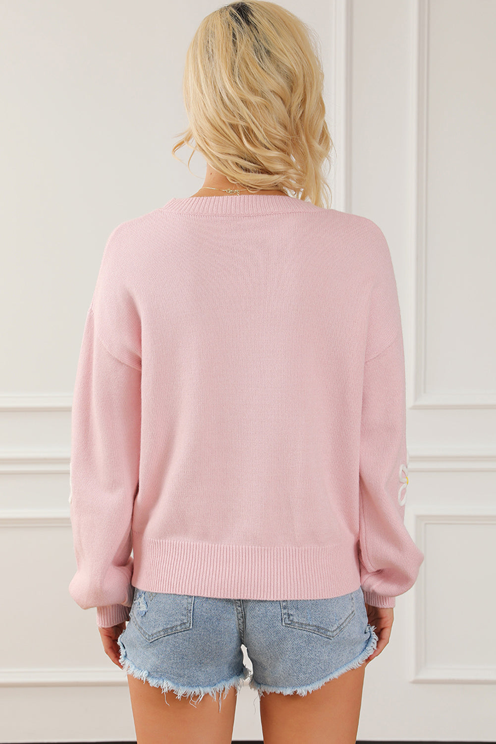 Stilla | Blomstret sweater med runde halsudskæring og overskårne skuldre