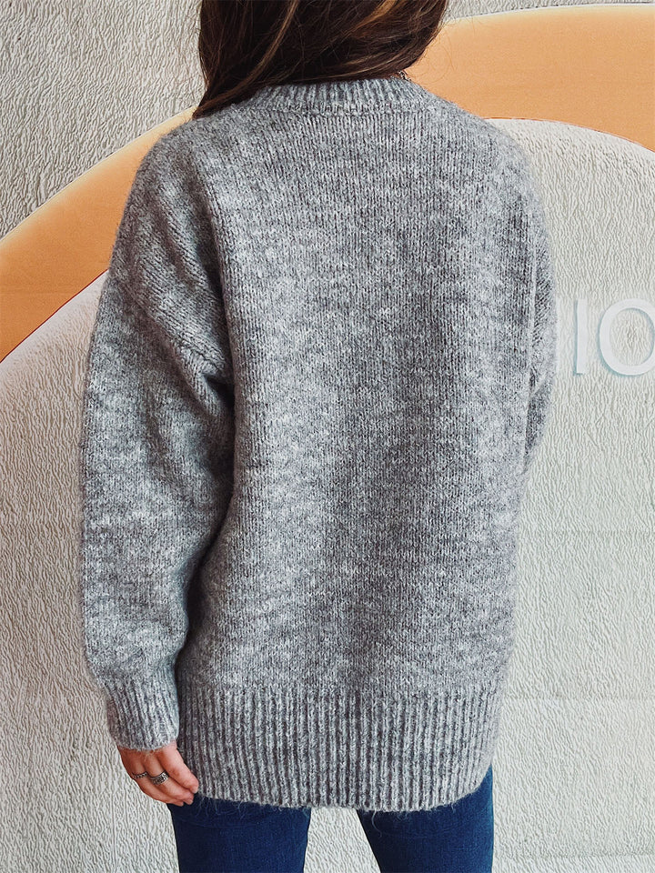 Stilla | Pullover med lange ærmer med slids og perlekant og rund halsudskæring
