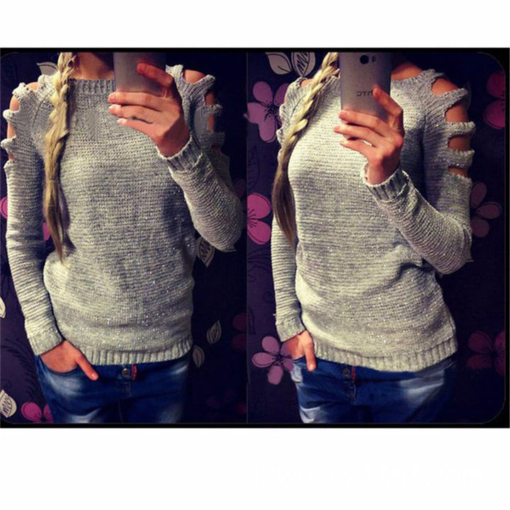 Dame strikket sweater med åbent skulderdesign og glitrende accenter Stilla