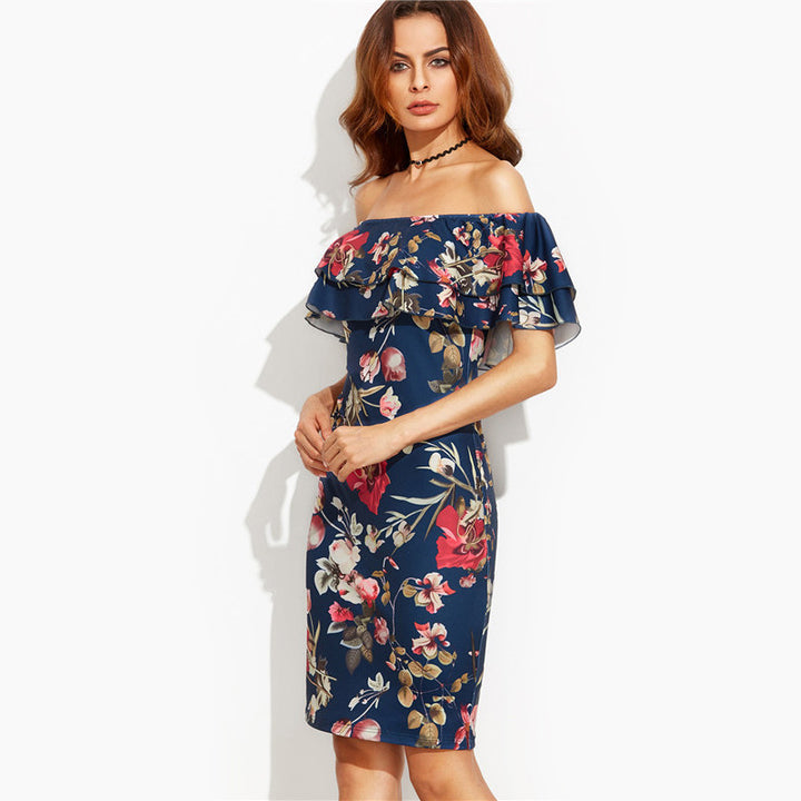 Kvindernes off-shoulder blomsterkjole med voluminøse flæsedetaljer og figursyet snit Stilla