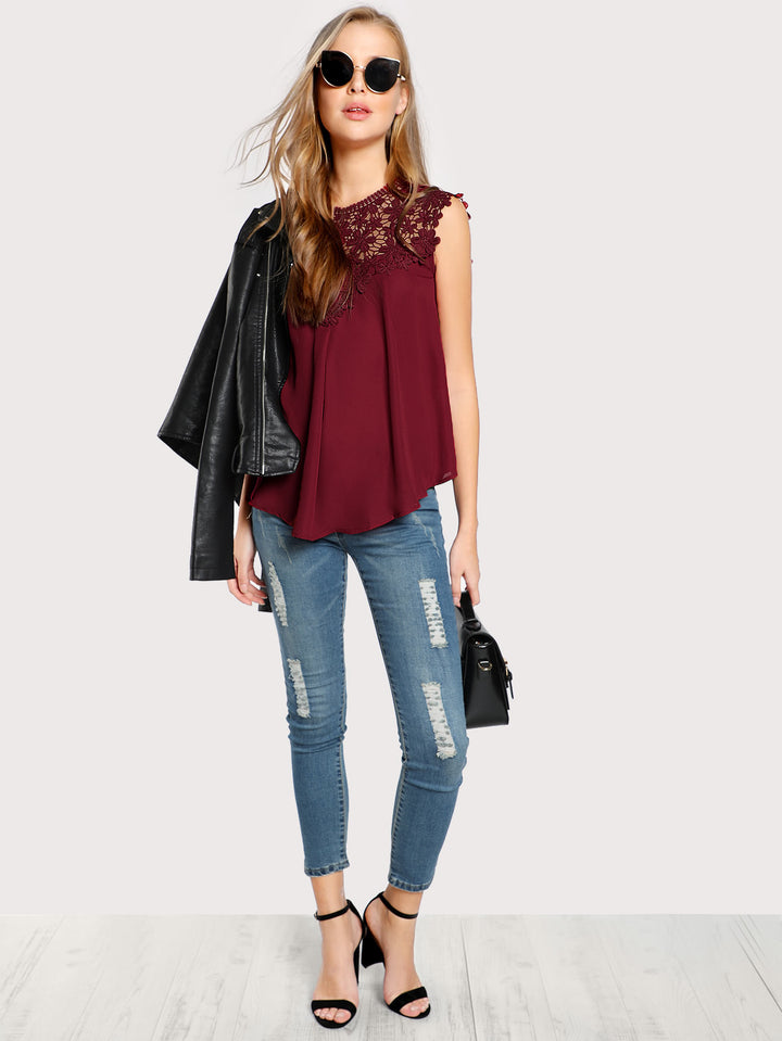 Dame bluse med filigrane broderidetaljer og elegant snit Stilla
