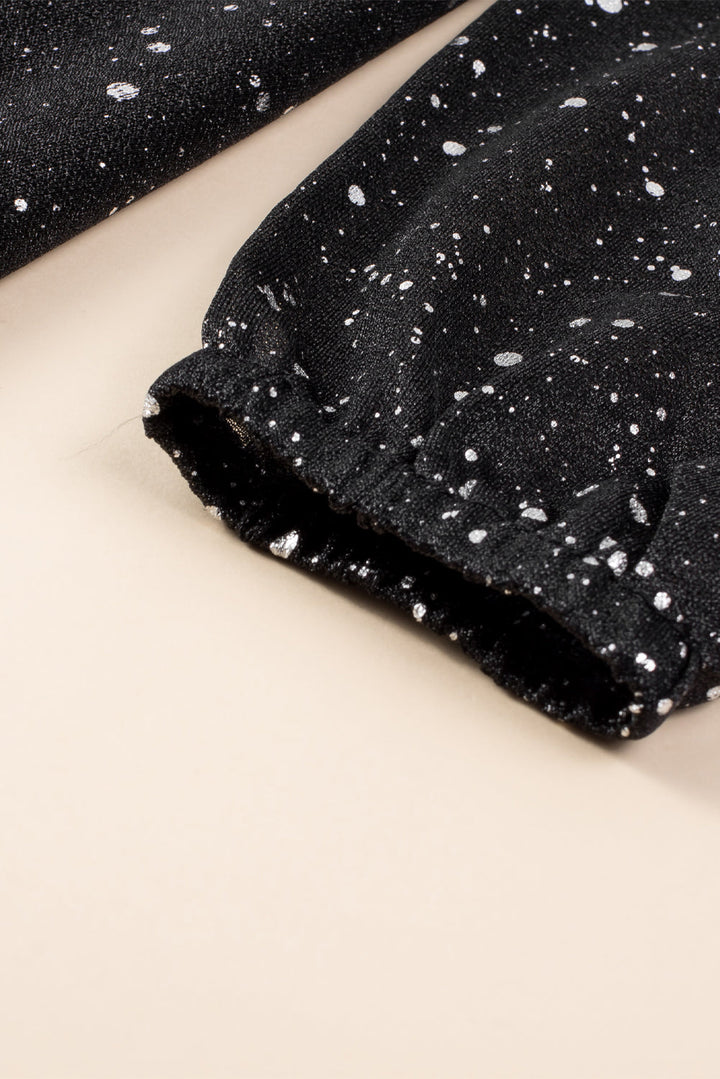 Stilla | Elegant sort glitrende kjole med mesh sene