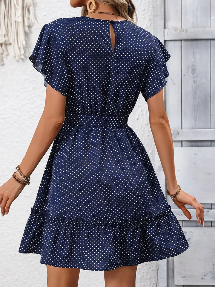 Stilla | Mørkeblå Midi Kjole Polkadot Elegant Sommerkjole Med Sløjfe Taljen