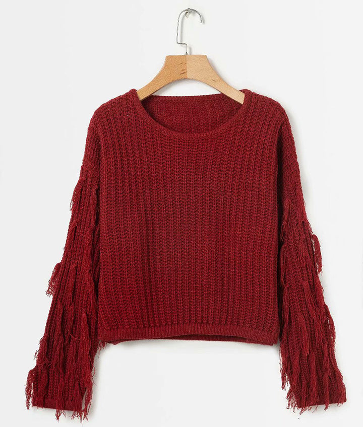 Kvindernes strikkede sweater med frynseærmer og en komfortabel pasform Stilla