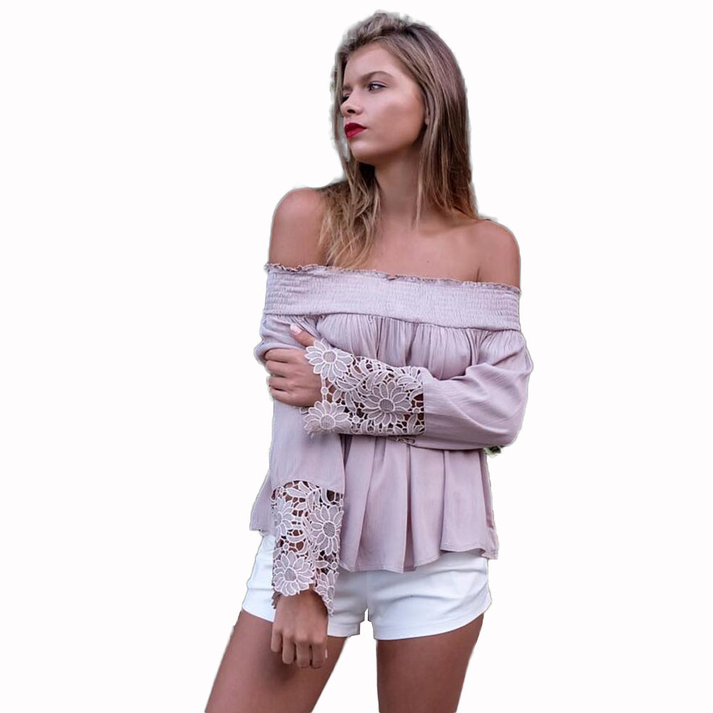 Kvinders bluse med off-shoulder design og blomsterlacemanchetter Skovae