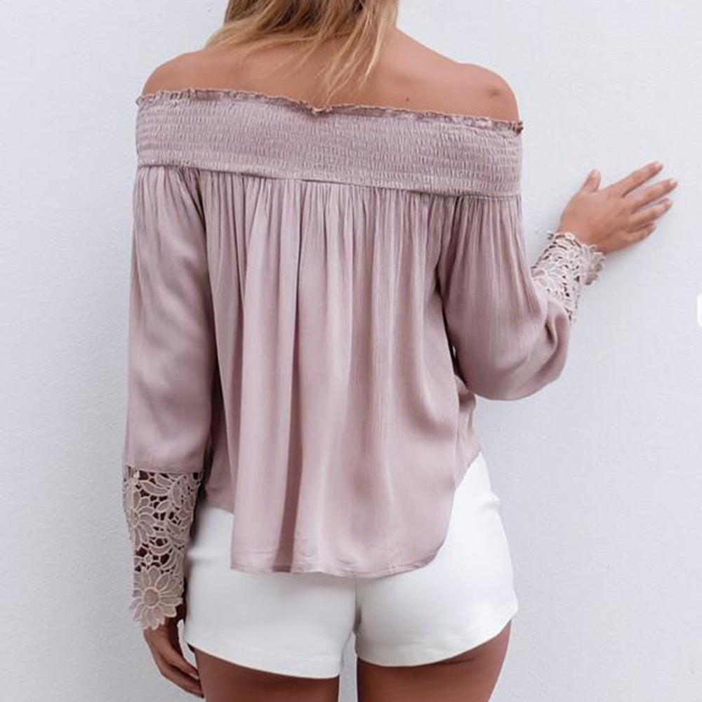 Kvinders bluse med off-shoulder design og blomsterlacemanchetter Skovae