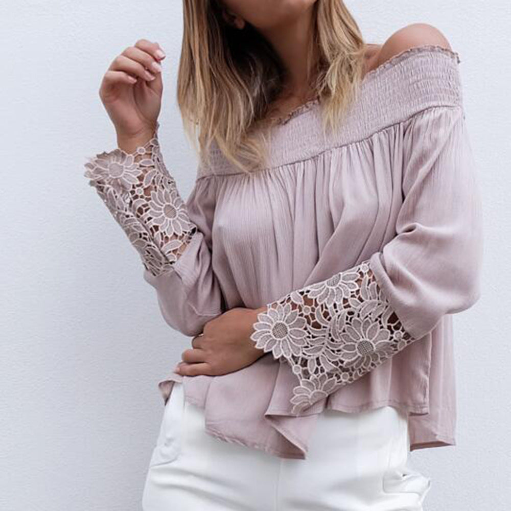 Kvinders bluse med off-shoulder design og blomsterlacemanchetter Skovae