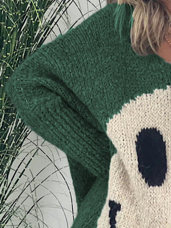 Stilla | Pullover med lange ærmer med et smilende ansigt og V-udskæring