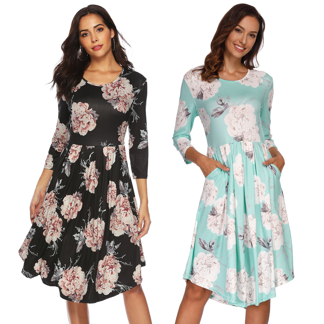 Dame Midikjole med blomstret design og sidelommer Stilla