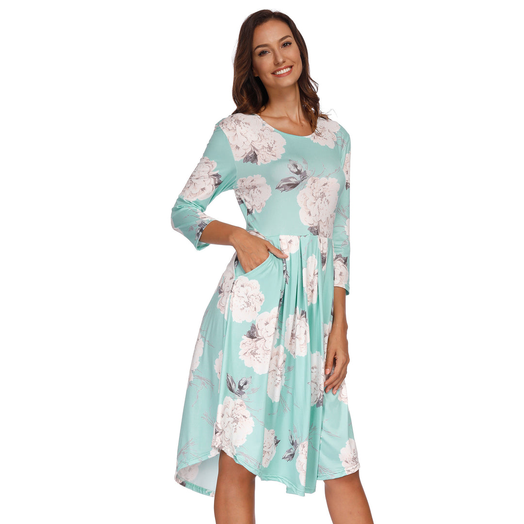 Dame Midikjole med blomstret design og sidelommer Stilla