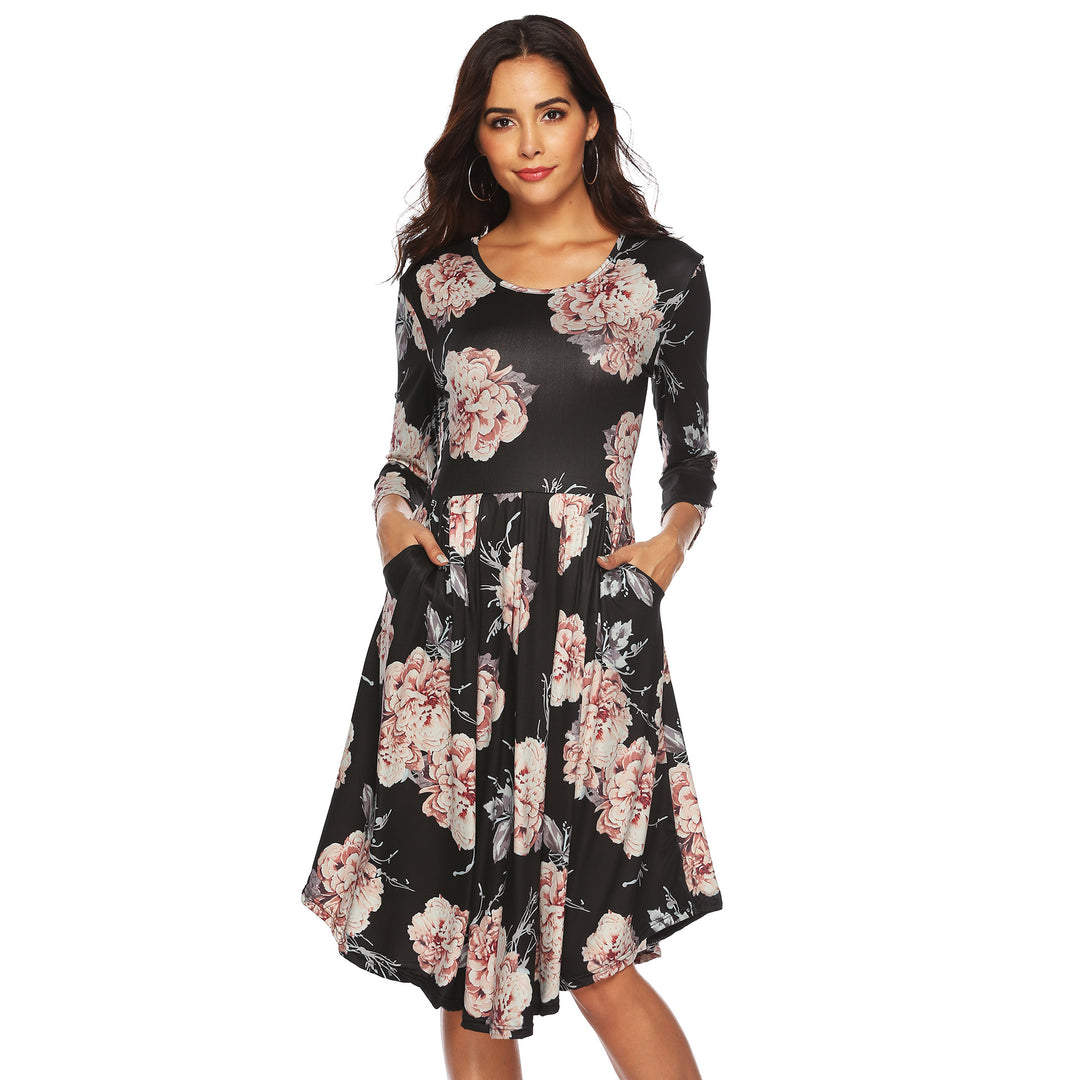 Dame Midikjole med blomstret design og sidelommer Stilla