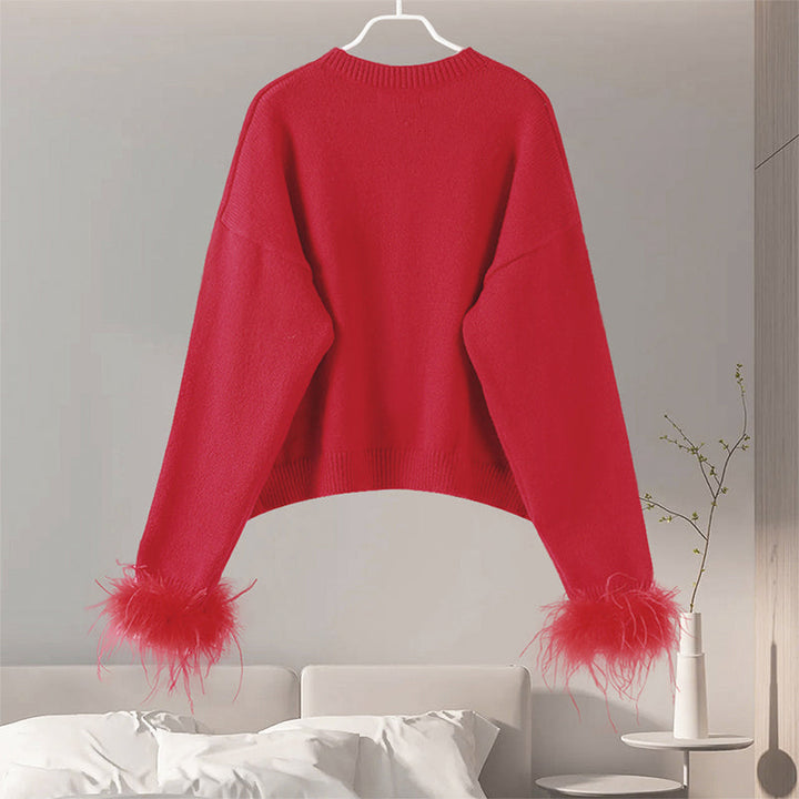 Stilla | Elegant cardigan med fjerakkenter