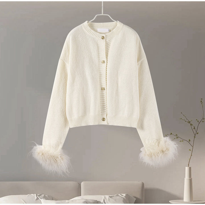 Stilla | Elegant cardigan med fjerakkenter