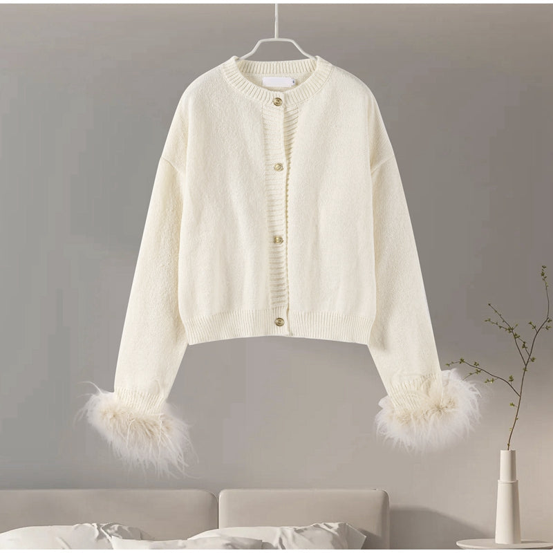 Stilla | Elegant cardigan med fjerdetaljer