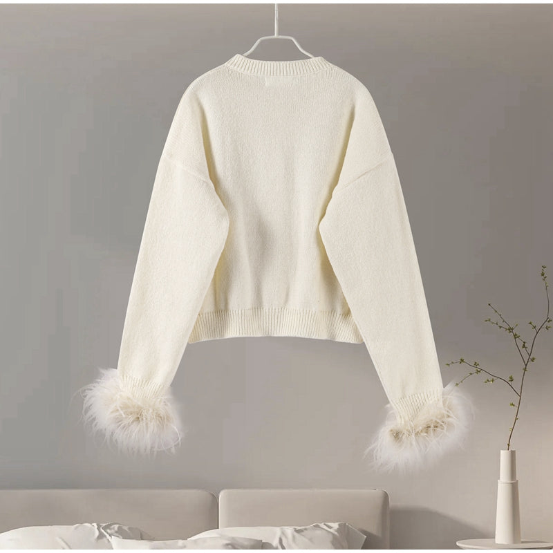 Stilla | Elegant cardigan med fjerdetaljer