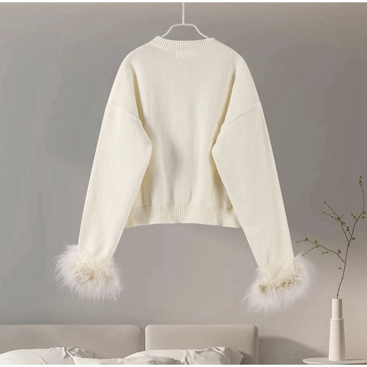 Stilla | Elegant cardigan med fjerdetaljer