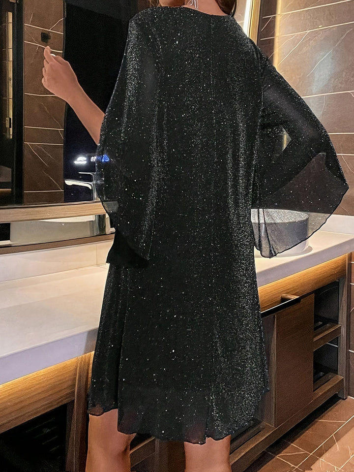 Stilla | Elegante Glitrende Kjole Med V-udskæring Og Slidsærmer