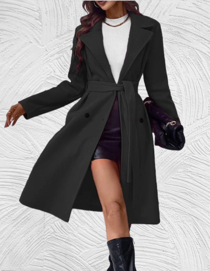 Stilla | Lang og oversized jakke med knaplukning, brystlommer og bælte