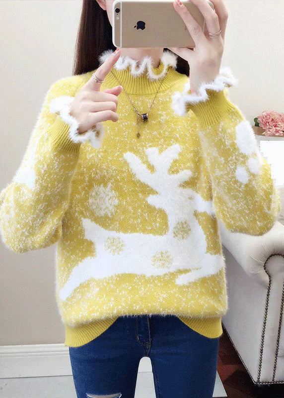 Stilla | Læderpullover med flæser og tykkere mink-dåb-broderi