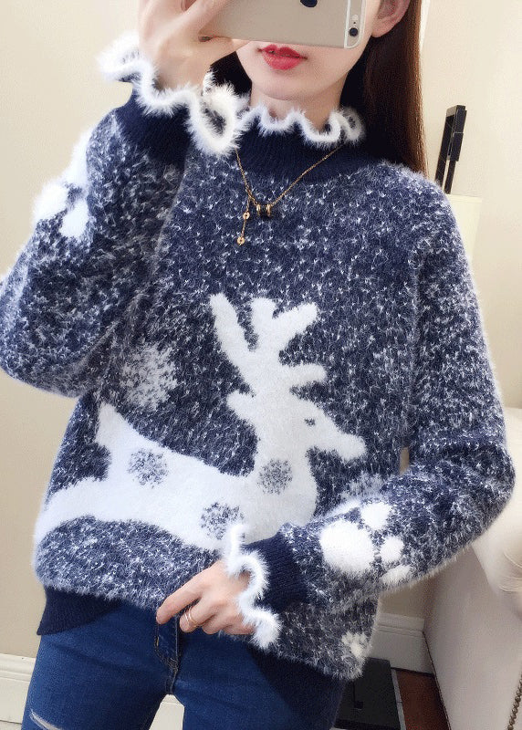 Stilla | Læderpullover med flæser og tykkere mink-dåb-broderi
