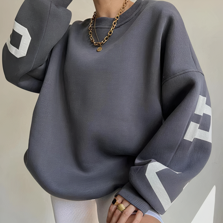 Stilla | Statement Sweater med typografi
