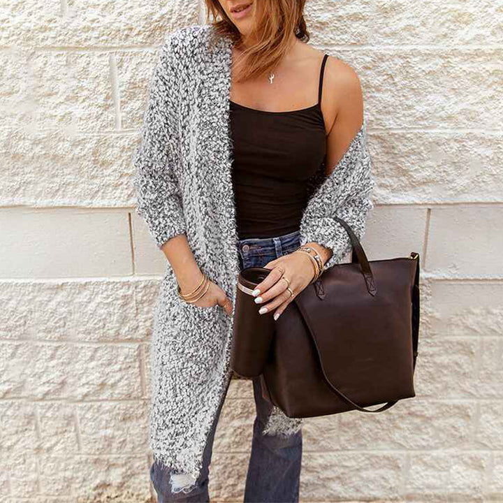 Stilla | Strikpullover med moderne statement