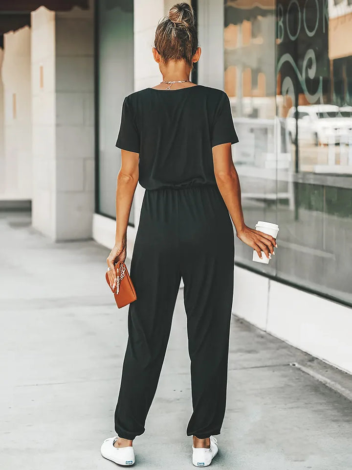 Stilla | Korte ærmer jumpsuit med V-udskæring